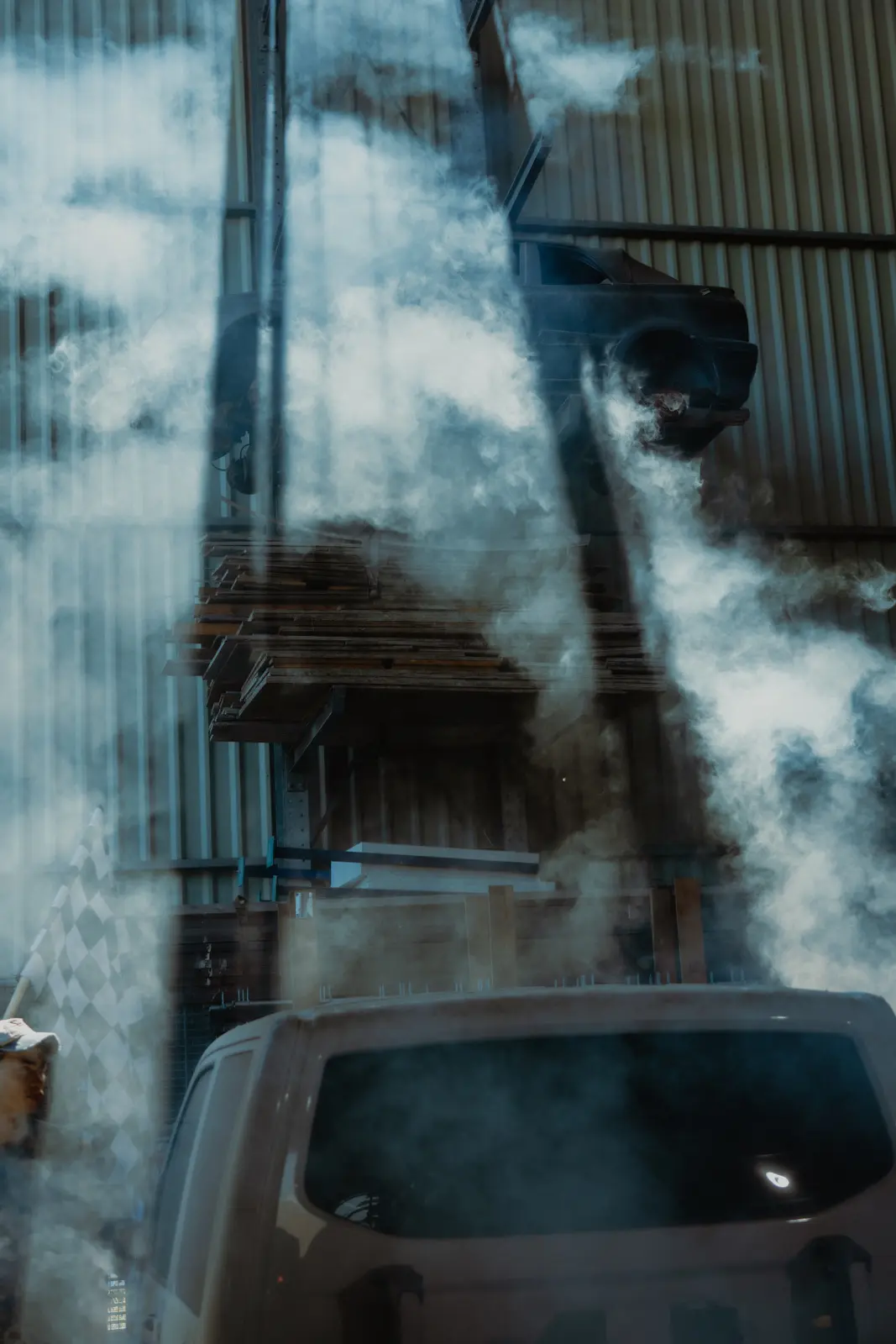 Industrial structures fading into a clouded route scene